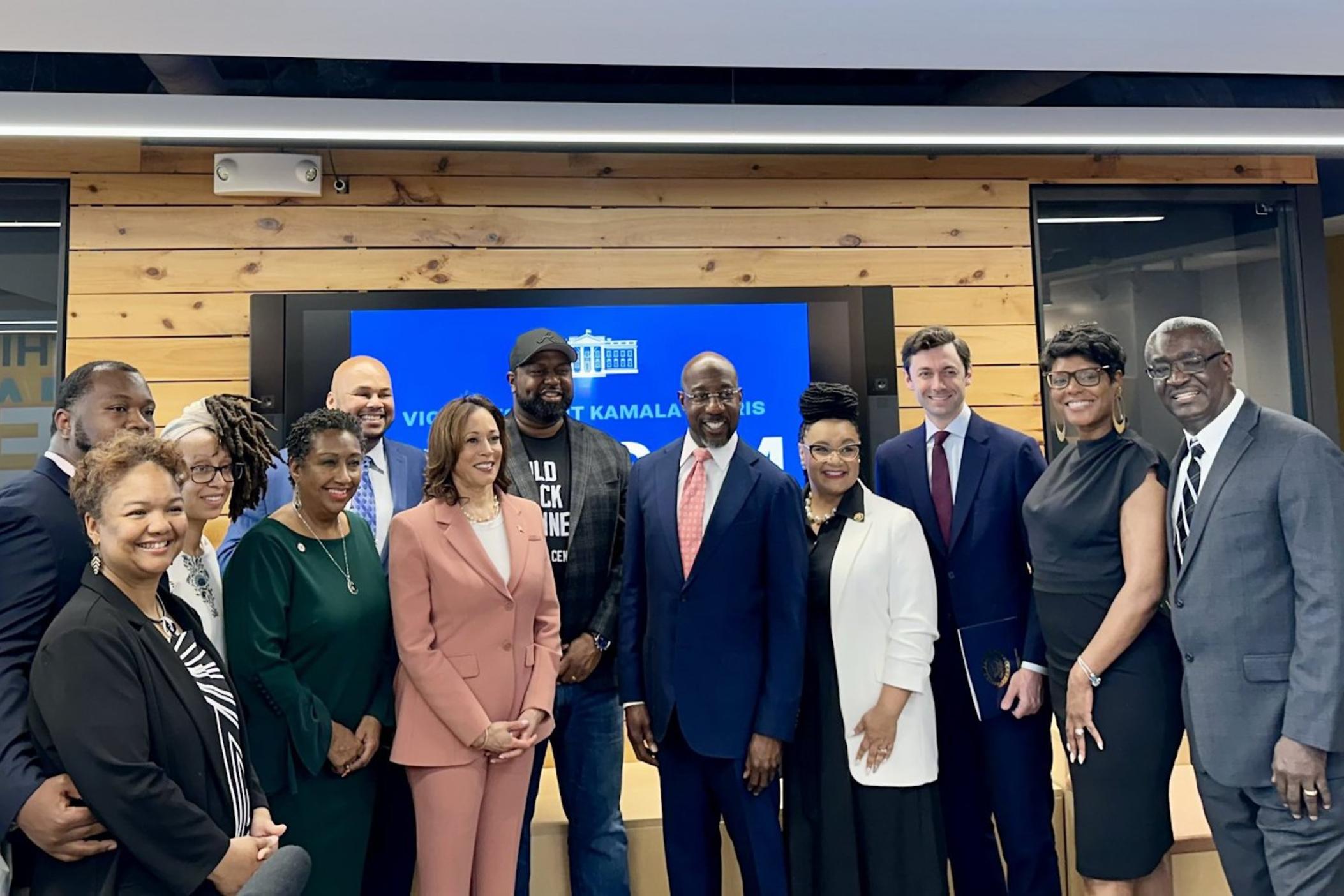 Vice President Kamala Harris (center, pink suit) joined Sens. Ossoff (third from right) and Warnock (center, pink tie) and Rep. Nikema Williams (fourth from right) along with other leaders at the Russell Innovation Center for Entrepreneurs on April 29, 2024.
