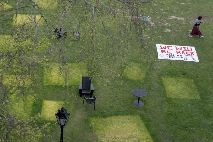 Squares mark a lawn where tents once stood at Brown University in Providence, R.I. It's one of several schools where administrators have struck deals with student protesters.