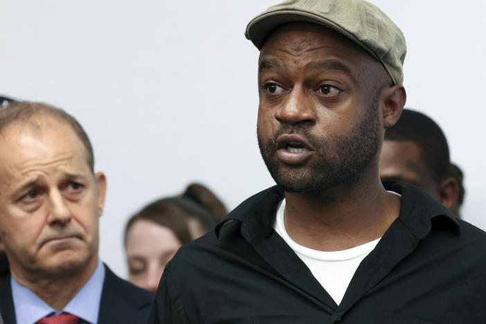 Jeffery Christian, right, speaks at a press conference in Chicago, on May 7. Christian and dozens of others claim they were sexually abused as children while incarcerated at Illinois juvenile detention centers, as part of a lawsuit recounting decades of allegations of systemic child abuse.