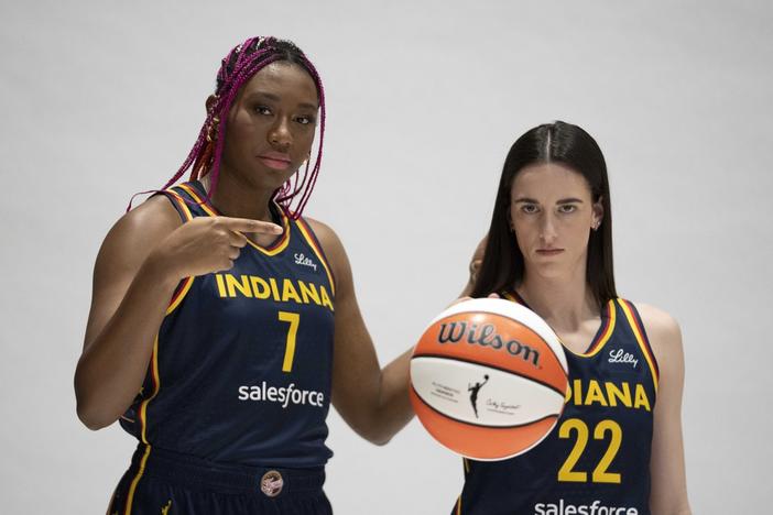 Indiana Fever's Aliyah Boston, left, and Caitlin Clark pose for a photo during the Indiana Fever media day, Wednesday, May 1, 2024, in Indianapolis. 