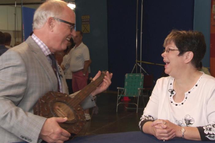 Watch Ken Farmer play the folk art banjo he appraised in Charleston, West Virginia!