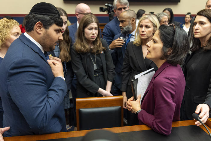 Kobie Talmoud, 16, left, a student at John F. Kennedy High School in Silver Spring, Md., speaks with Karla Silvestre, President of the Montgomery Count (Md.) Board of Education, after a congressional hearing on antisemitism in K-12 public schools.
