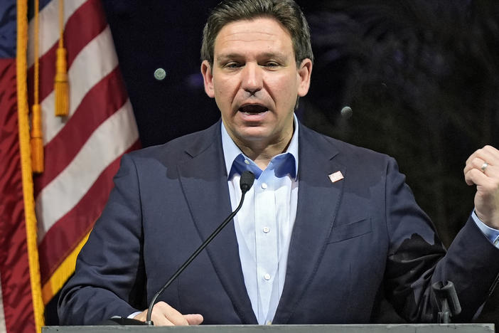 Florida Gov. Ron DeSantis speaks at a Feb. 8 luncheon in Tampa, Fla. Climate change will be a lesser priority in Florida and largely disappear from state statutes under legislation signed Wednesday by DeSantis.