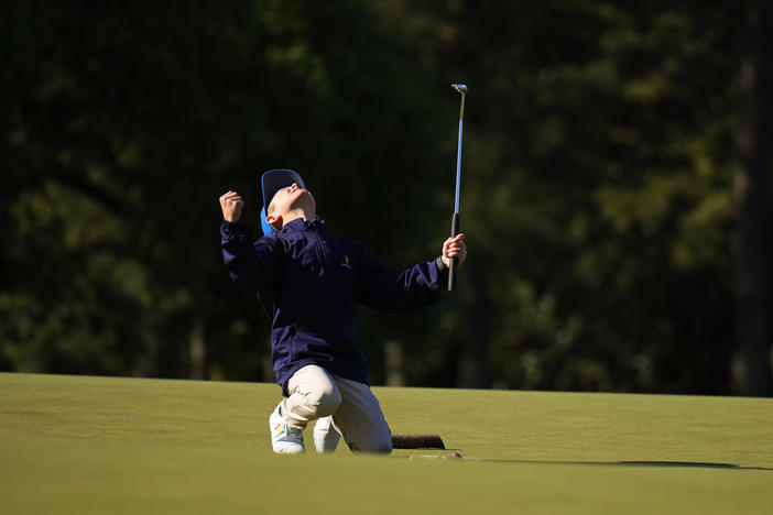 Jacob Eagan, 9, of Castle Rock, Colo., react after a putt at the Drive Chip & Putt National Finals at Augusta National Golf Club, Sunday, April 2, 2023, in Augusta, Ga.