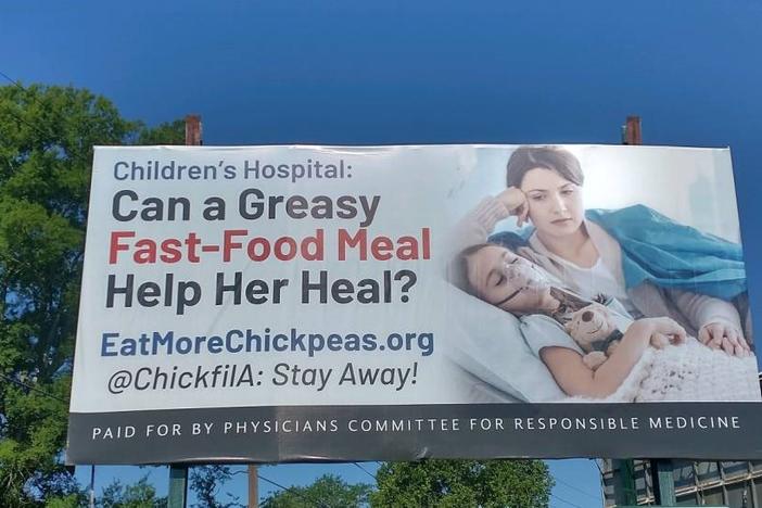 A billboard opposing a Chick-fil-A in Children's Hospital of Georgia