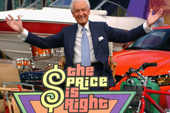 Bob Barker poses among a sea of prizes at the 6,000th taping of <em>The Price Is Right,</em> in 2004. Barker, who hosted the show for decades, was twice named TV's "Most Durable Performer" by Guinness World Records.