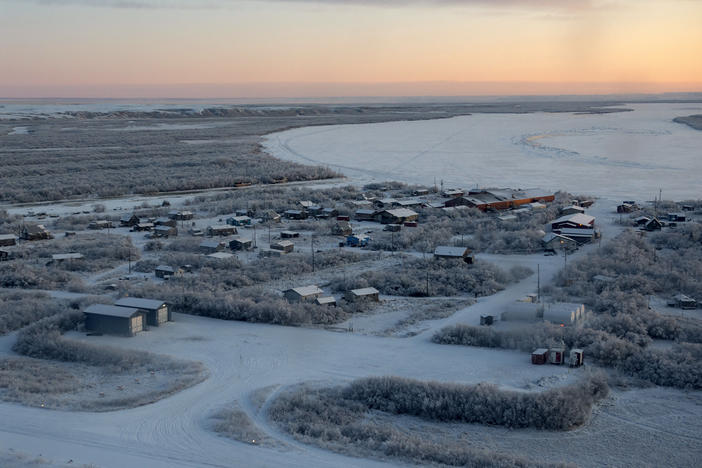 This photo from 2019 provided by the U.S. Air Force/Alaska National Guard photo shows how closely the village of Napakiak, Alaska is at risk of severe erosion by the nearby Kuskokwim River.