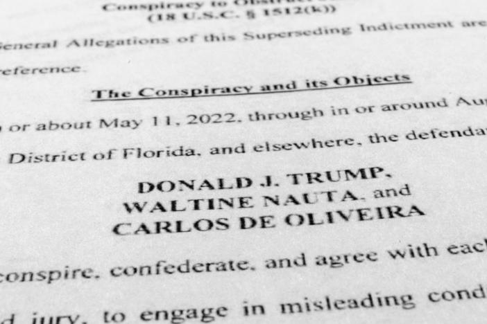 Former President Donald Trump, aide Nauta and Mar-a-Lago property manager Carlos de Oliveira face some 40 criminal counts over classified documents found at Trump's Florida residence and club.