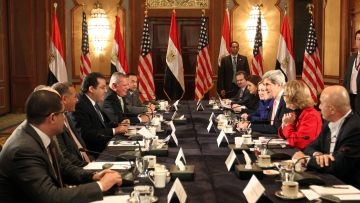 Secretary of State John Kerry (center, right) meets with members of Egyptian political parties in Cairo Saturday.