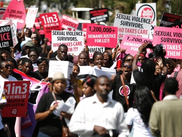 Hundreds of people take to the streets in Nairobi, Kenya, on Thursday, calling for justice for a 16-year-old woman dubbed "Liz" who was gang-raped by six young men in rural Kenya. The men were caught by the police and let go after their punishment cutting the grass at the local police station.