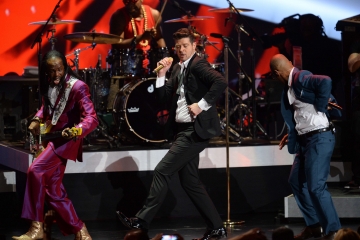Robin Thicke, center, performs with Verdine White, left, and T.I. at The Grammy Nominations Concert Live!! in Los Angeles in December. Thicke is nominated for Outstanding Male Artist at the NAACP Image Awards this year.