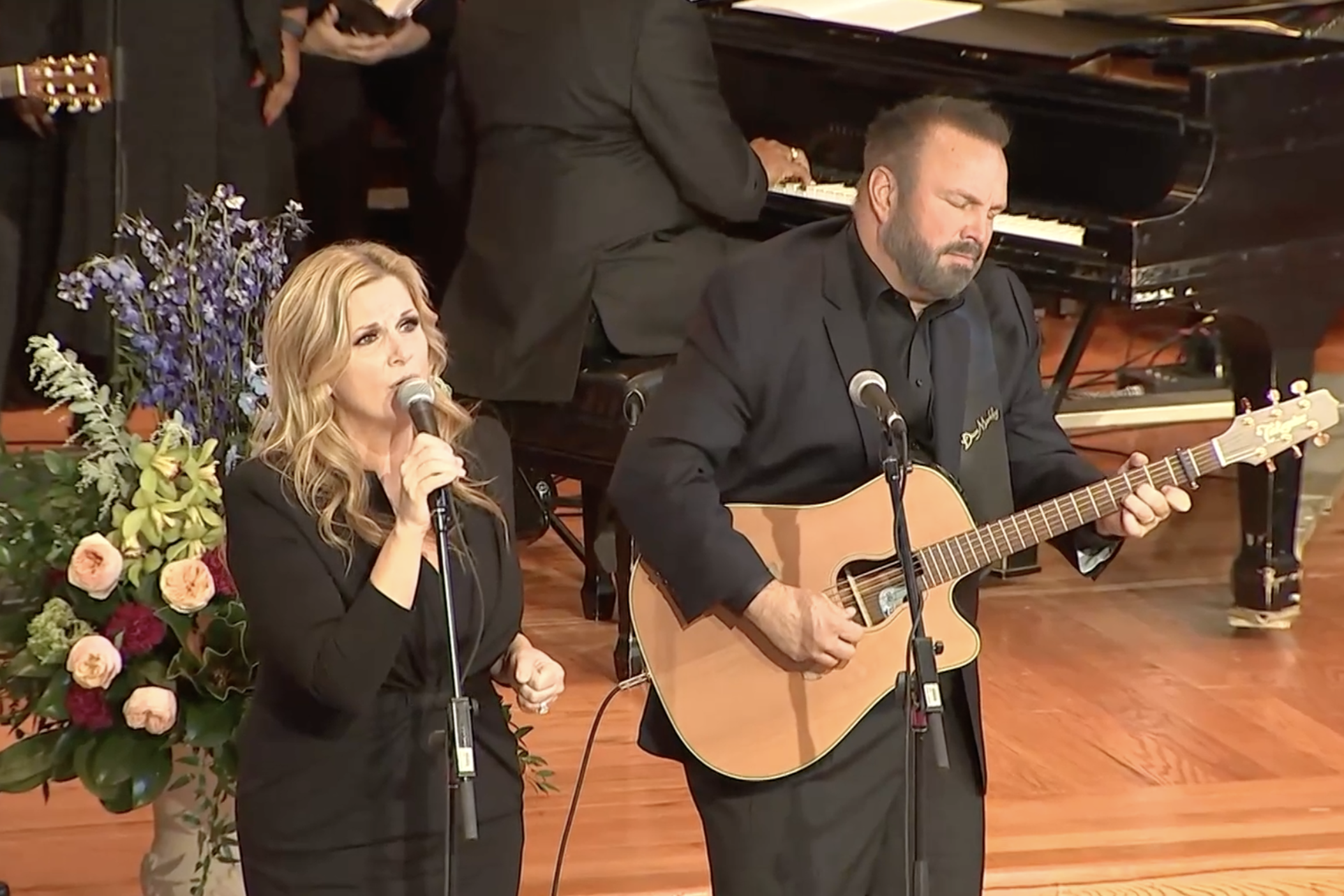 Country music stars and Habitat for Humanity ambassadors Trisha Yearwood and Garth Brooks perform John Lennon and Yoko Ono's "Imagine" as a tribute to their friend Rosalynn Carter during a celebration of life service for the former first lady at Glenn Memorial United Methodist Church in Atlanta on Nov. 28, 2023.