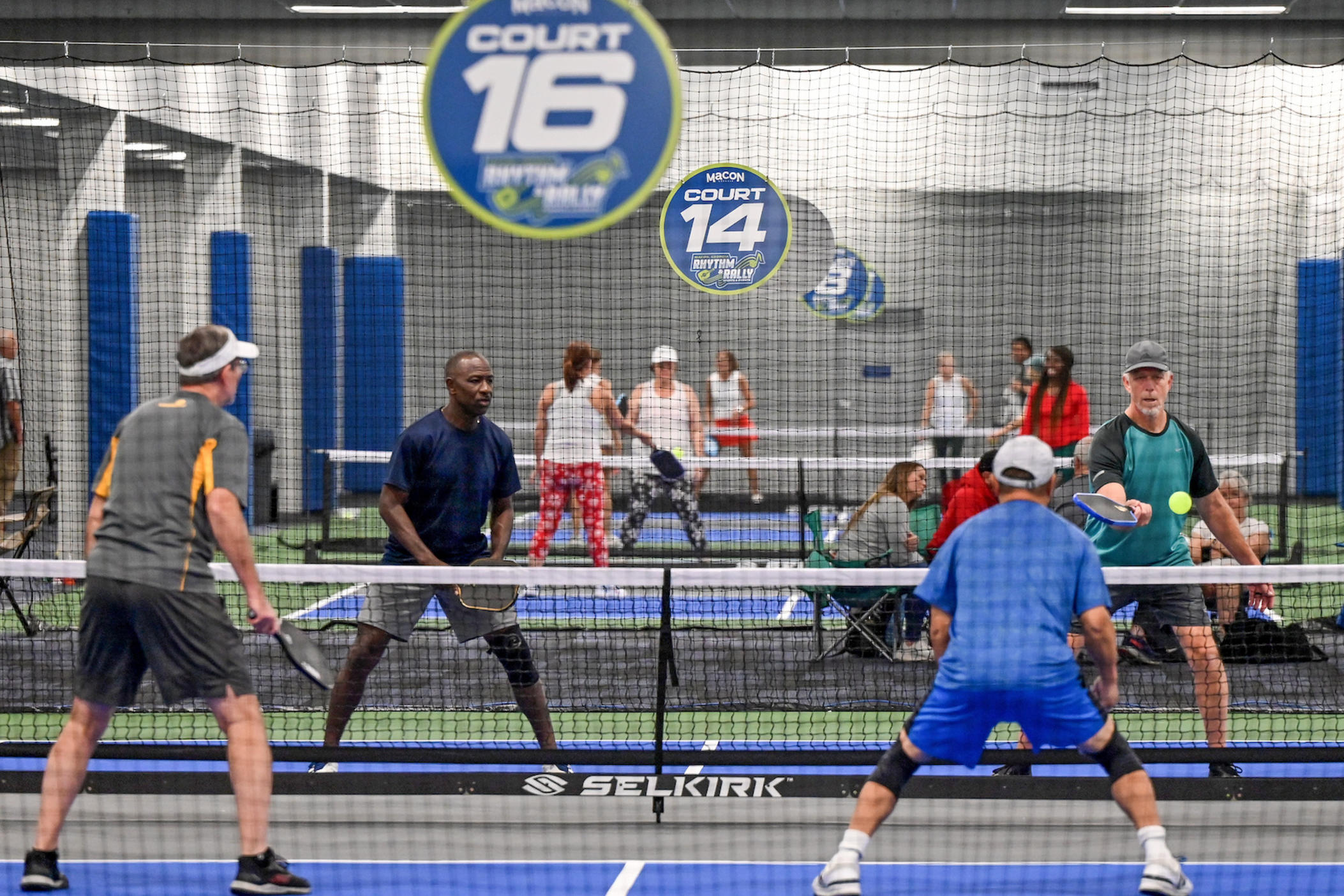Pickleball players compete in the Southern Pickleball Association's Candy Cane Classic at Rhythm & Rally in Macon, Ga. 