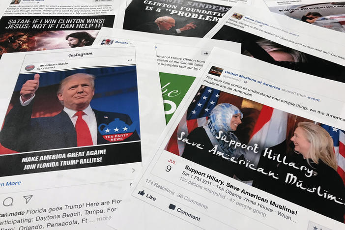 FILE - This Nov. 1, 2017 file photo shows printouts of some of the Facebook and Instagram ads linked to a Russian effort to disrupt the American political process and stir up tensions around divisive social issues, released by members of the U.S. House Intelligence committee, photographed in Washington. (AP Photo/Jon Elswick, File)