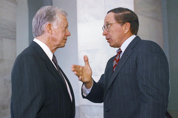 Sen. Sam Nunn (D-Ga.), right, gestures while talking to former President Jimmy Carter on Capitol Hill in Washington, March 31, 1992. Carter was in Washington to discuss the Atlanta Project, a program of the Carter Center, which seeks to bring together civil, religious, and business leaders and government agencies to work in Atlanta's poorest neighborhoods.