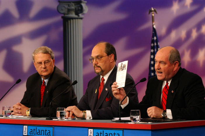 In 2002, then-Gov. Roy Barnes (GA-D), left, and Garrett Hayes, center, listen to Sonny Perdue, right, speak during a gubernatorial debate at GPB. Perdue would go on to defeat Barnes, becoming the first Republican to serve as Georgia's governor since Reconstruction. 