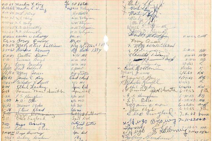 Martin Luther King Jr.'s name and autograph tops a pair of pages from a Birmingham jail logbook