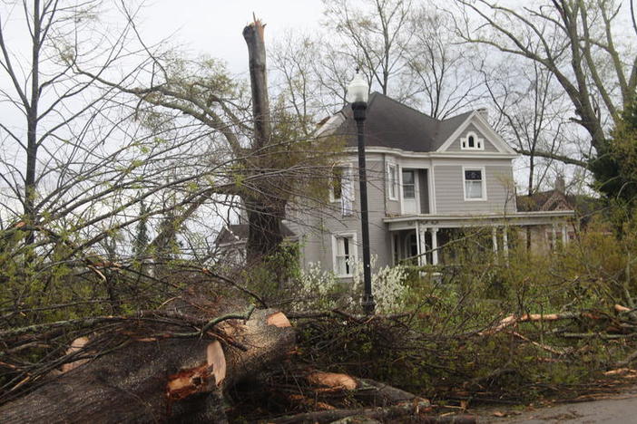 A Newnan, Georgia home has debris left around it after deadly Tornado.