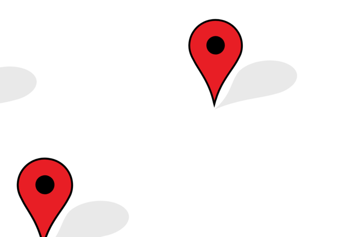 An illustration of location pins on a white background.