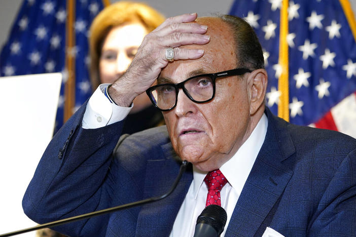 Former New York Mayor Rudy Giuliani, who was a lawyer for former President Donald Trump, speaks during a news conference at the Republican National Committee headquarters in Washington, on Nov. 19, 2020. Giuliani is scheduled to appear in an Atlanta courthouse on Aug. 17, 2022, to testify before a special grand jury in an investigation into possible illegal attempts to influence the 2020 election in Georgia.
