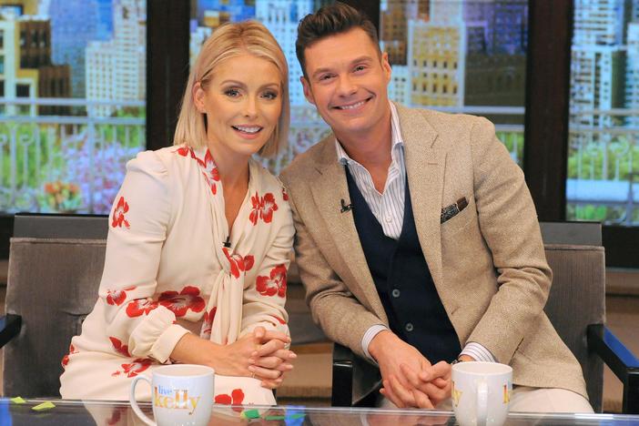 Kelly Ripa, left, and Ryan Seacrest on the set of "Live! With Kelly and Ryan" in 2021.