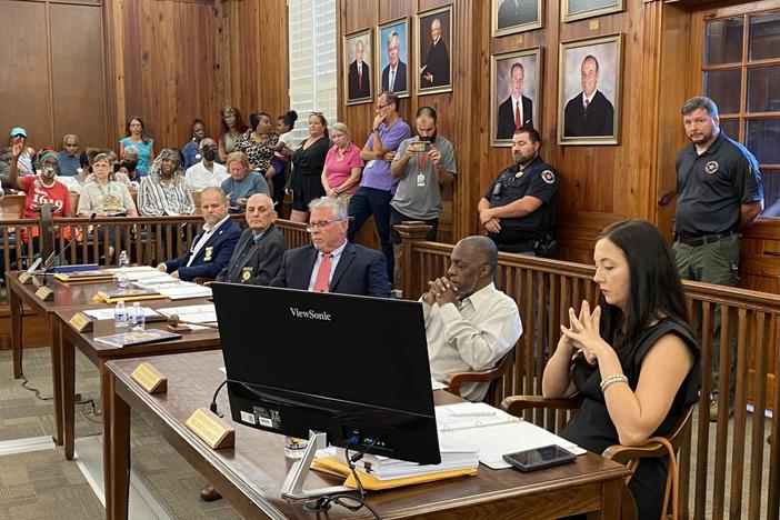 From left to right, McIntosh County Commissioners Davis Poole, William Harrell, David Stevens, Roger Lotson and Kate Karwacki sit for a board meeting at the McIntosh County Courthouse on Tuesday, Sept. 12, 2023.