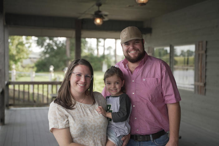 Becca & Jarrod Creasy, with daughter Finley, are the owners of 920 Cattle & Company