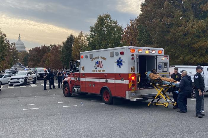 First responders load a suspect identified as Ahmir Lavon Merrell, 21, into an ambulance after U.S. Capitol Police used a taser on him and arrested him for allegedly carrying a semi-automatic firearm near the U.S. Capitol building on Tuesday, Nov. 7, 2023.