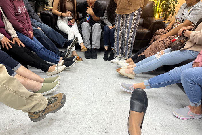 A small group gathers in a room in an office inside a Dalton, G eorgia, grocery store in mid - November to discuss mental health and suicide among this community’s large Latin o population. The suicide rate among Latinos has increased significantly in the U.S. over the past decade. 