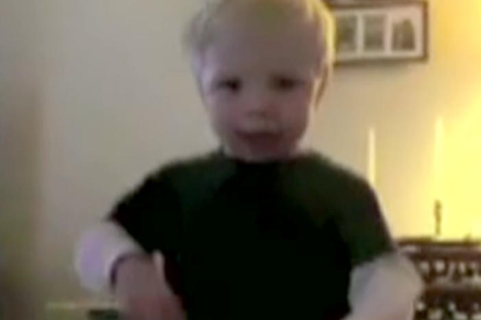 A screenshot of Spencer's winning Curious George Dance contest moves.