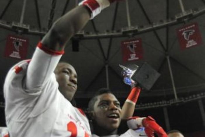 Photo special to GPB. Alex Chisum (L) and Ronnie Bell (R) celebrate after Sandy Creek's state final win over Carrollton.