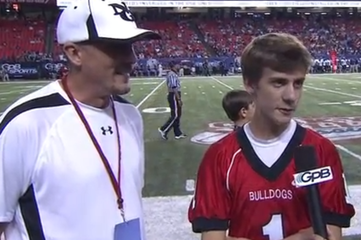 GPB Sports interviews Cooper as North Gwinnett takes on Camden County at the Georgia Dome on August, 2013.