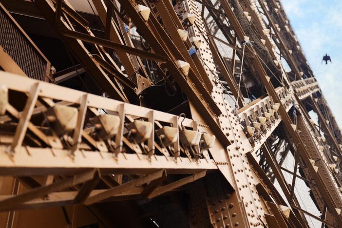 Eiffel’s use of iron to build his tower represented a radical architectural shift.