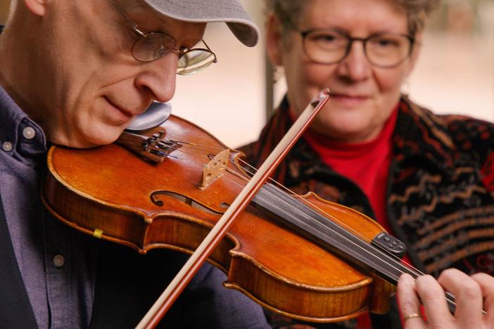 David Holt talks to Paul Brown and Terri McMurray. They play the fiddle tune “Sally Ann.”