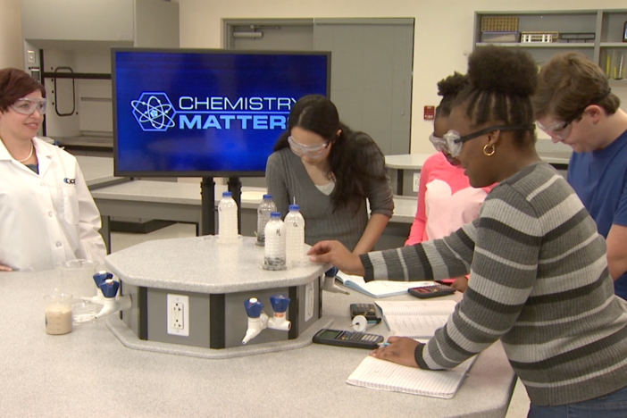     The students perform a rocket combustion lab in this segment.  