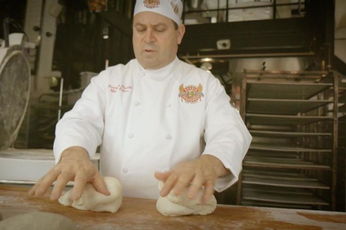 Michael Mosley demonstrates what kneading does to bread dough.