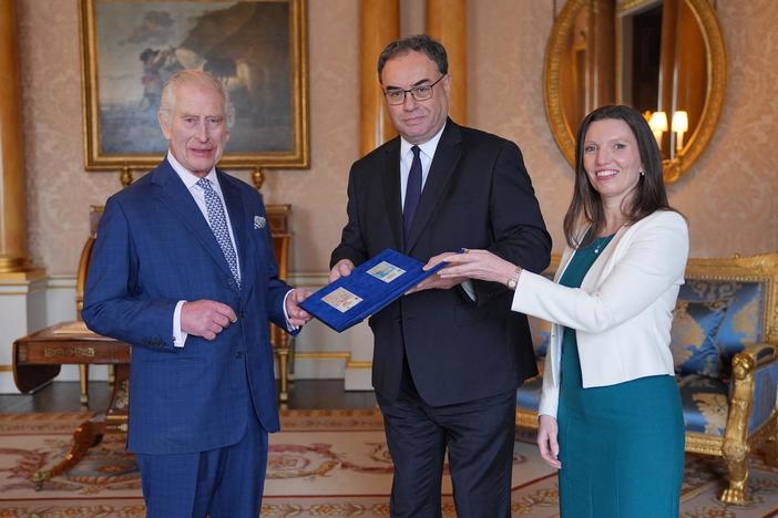 King Charles presented with first banknotes bearing his portrait