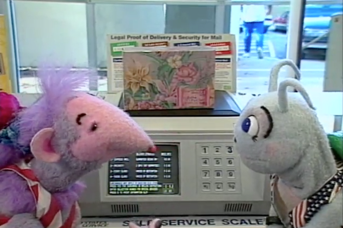 Blossom and Snappy help Digit mail a surprise package to Robbie.