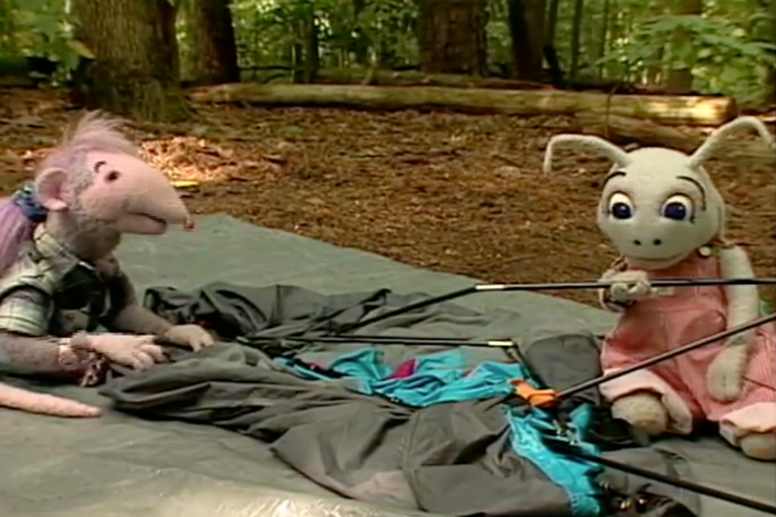 Blossom and Snappy help prepare Robbie for her camping trip. 