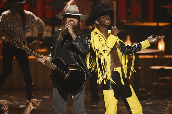 Billy Ray Cyrus, left, and Lil Nas X perform "Old Town Road" at the BET Awards on Sunday, June 23, 2019, at the Microsoft Theater in Los Angeles. 