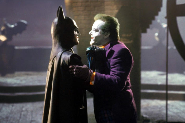 Michael Keaton as Batman, left, and Jack Nicholson as Joker starred in the 1989 Tim Burton film "Batman."