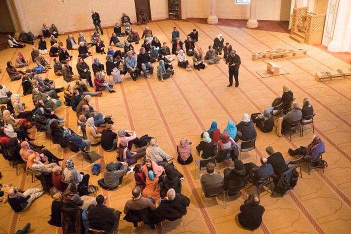 People gathered at Al-Farooq Masjid for a "Vist a Mosque" event hosted by the Islamic Speakers Bureau of Atlanta.