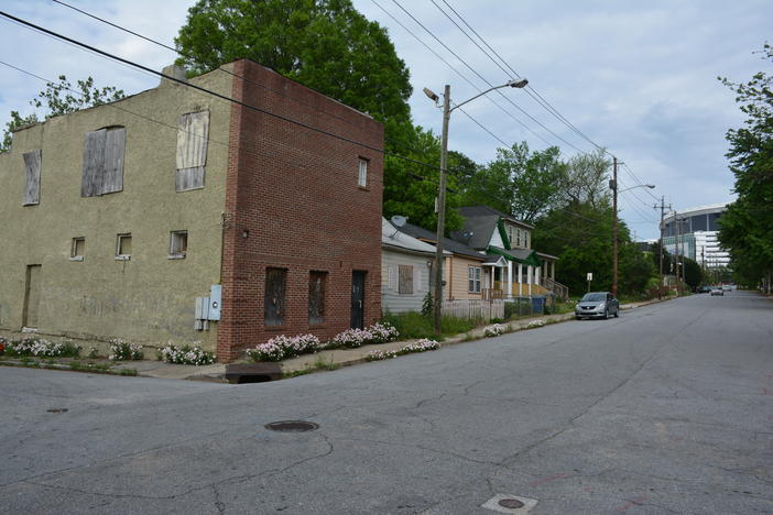 Boarded up buildings and homes are a common sight in the west Atlanta neighorhoods of Vine City and English Avenue