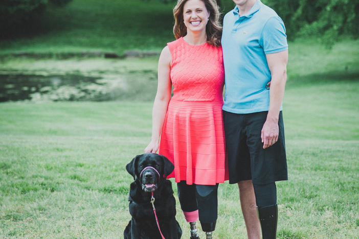 Authors, Jessica Kensky and Patrick Downes pictured with service dog, Rescue.