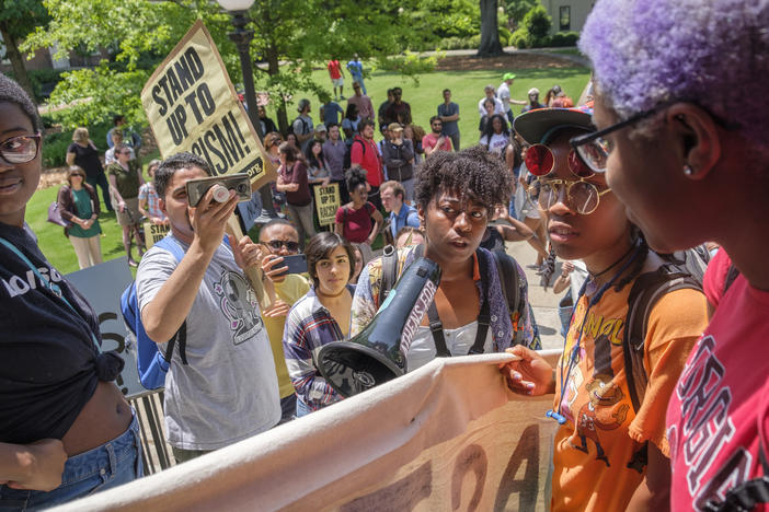 Protesters marched on the steps of UGA's Administration Building this spring to demand reparations.