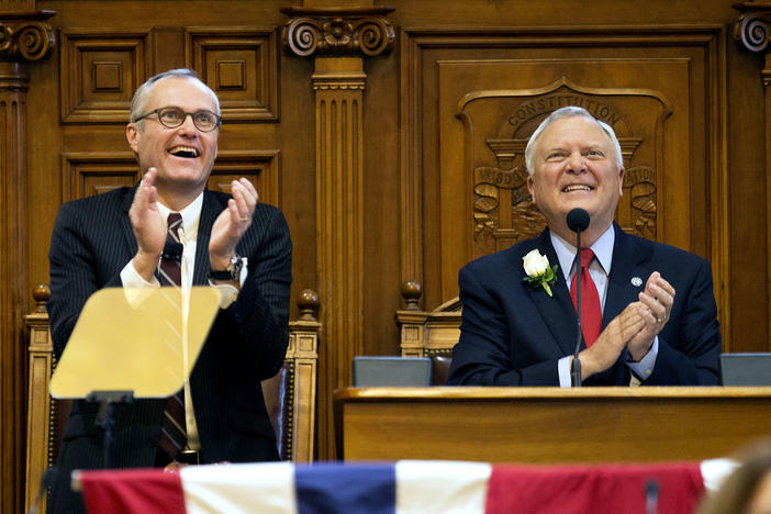 Georgia Gov. Nathan Deal, right, looks up along with Lt. Gov. Casey Cagle, left, while speaking during an inaugural ceremony to begin his second term in office at the state Capitol.