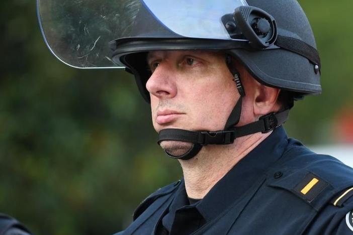 A bill to add protections for police officers awaits Governor Brian Kemp's signature.