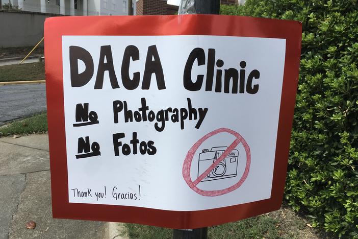 Handmade sign for DACA Renewal Clinic at Mercer University's School of Law.
