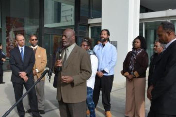 Members of Sapelo Island's Gullah Geechee community speak after filing their lawsuit in Atlanta.