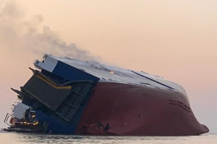 Federal, state and local agencies are working to stabilize the Golden Ray cargo ship so that the search for four missing crew members can continue.